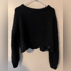 Cropped black knit sweater